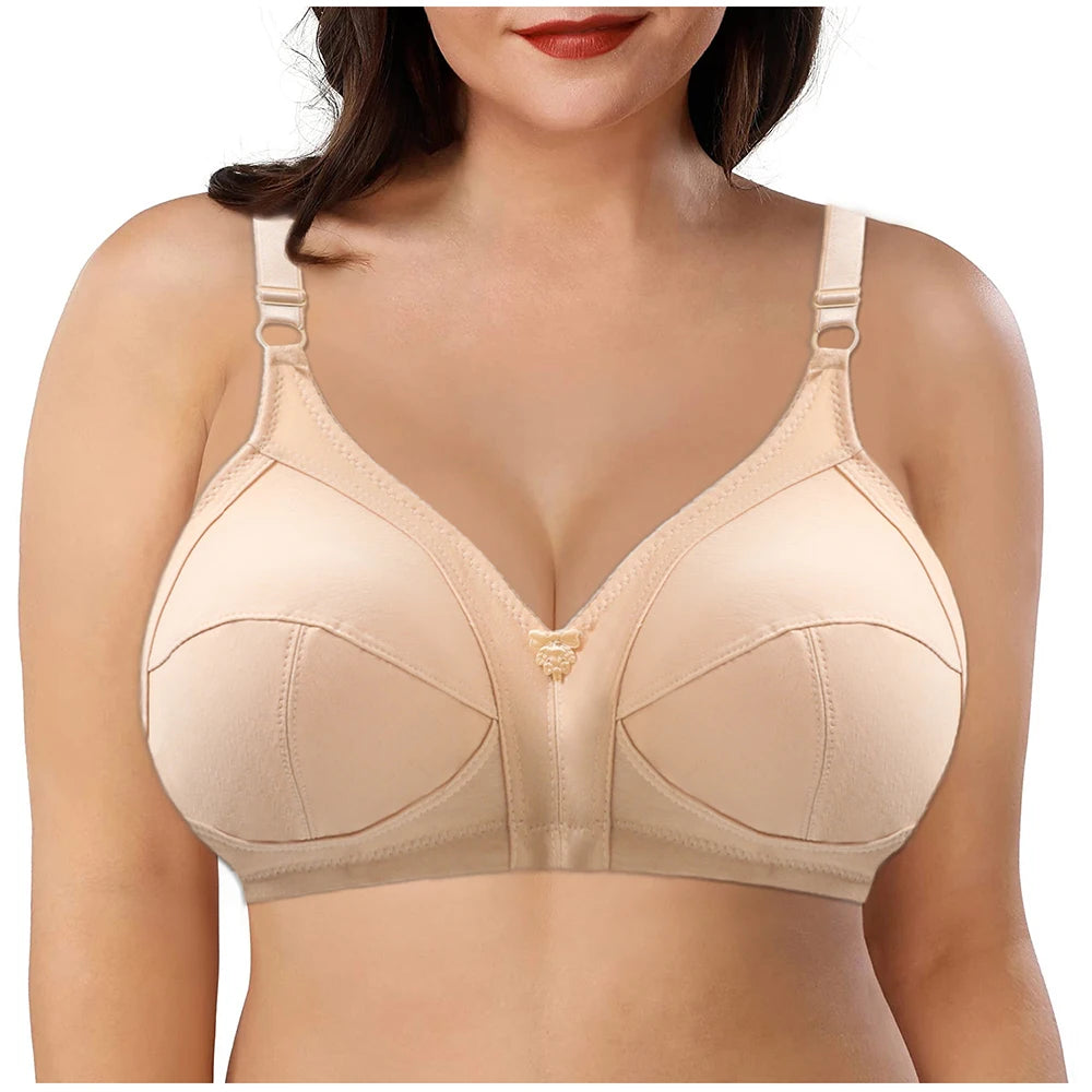Beige bra worn by a model on a white background