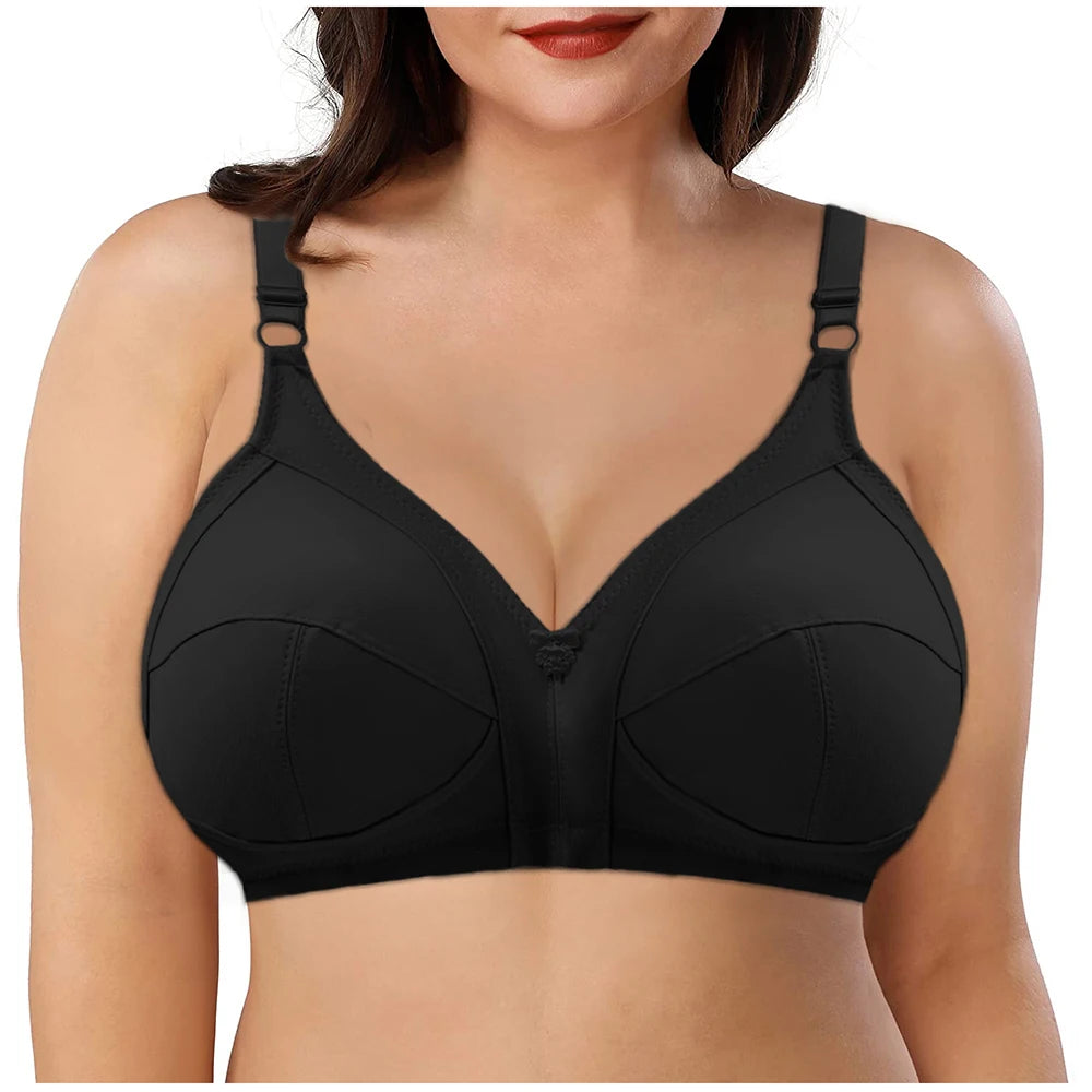 Black bra worn by a model on a white background