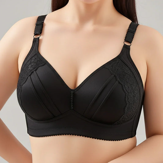 Black bra with lace details on a neutral background