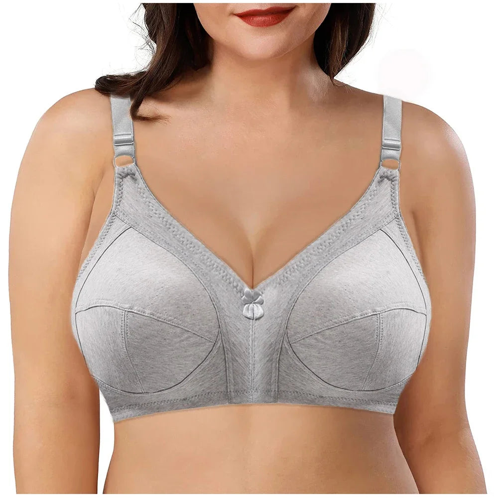 Gray bra worn by a model on a white background