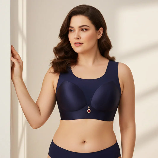 Woman wearing a navy blue sports bra and underwear set against a beige background