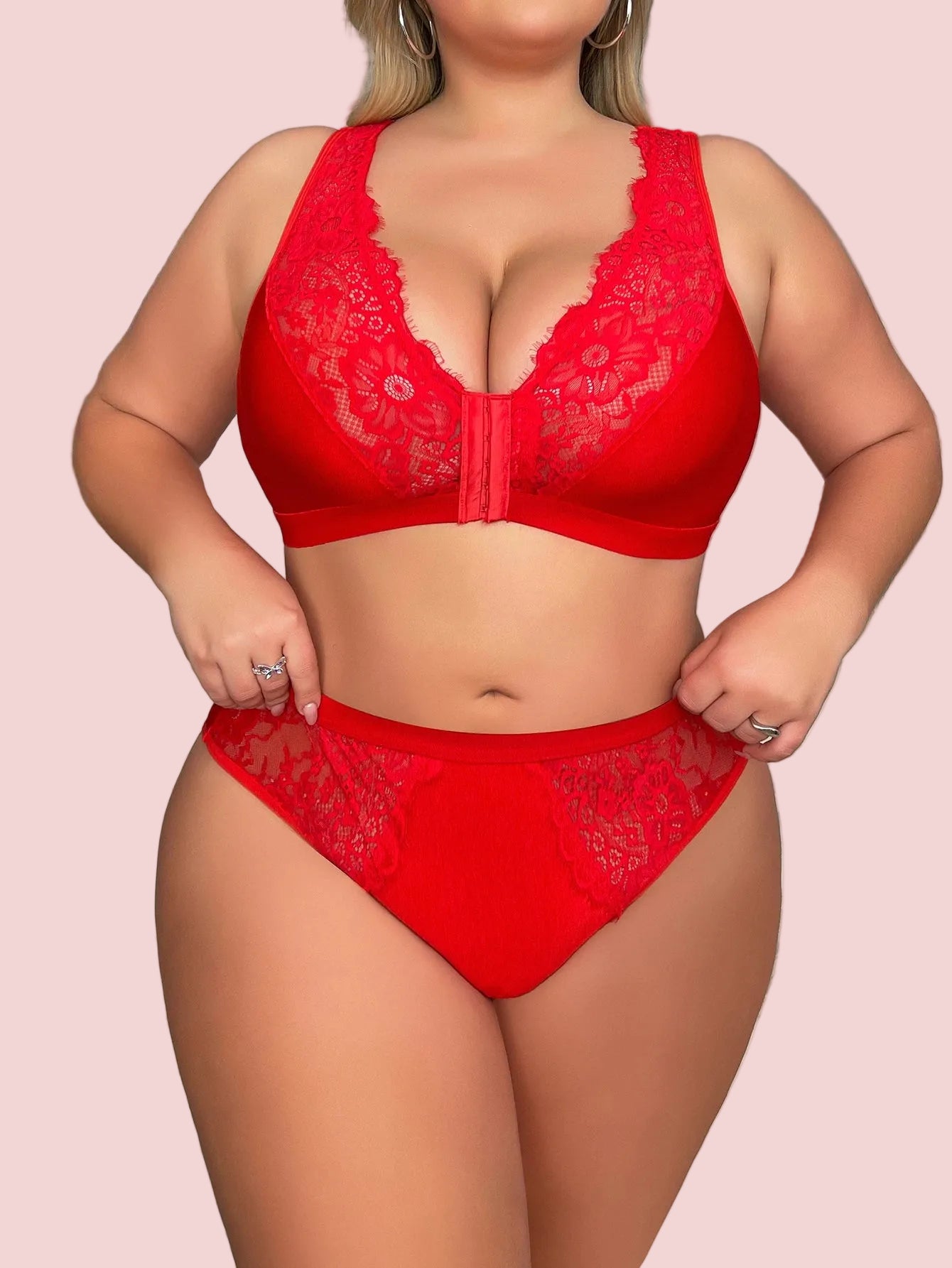 Red lace lingerie set on a marble staircase background