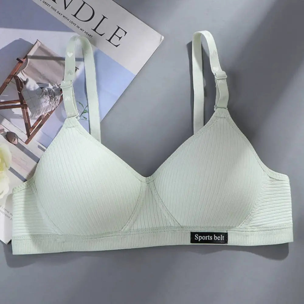 Light green bra on a gray background with 'Sports belt' label
