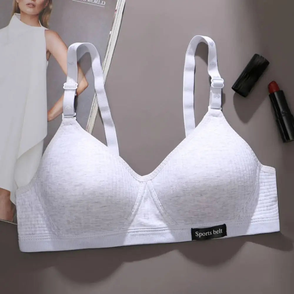 White bra with 'Sports belt' label on a gray background