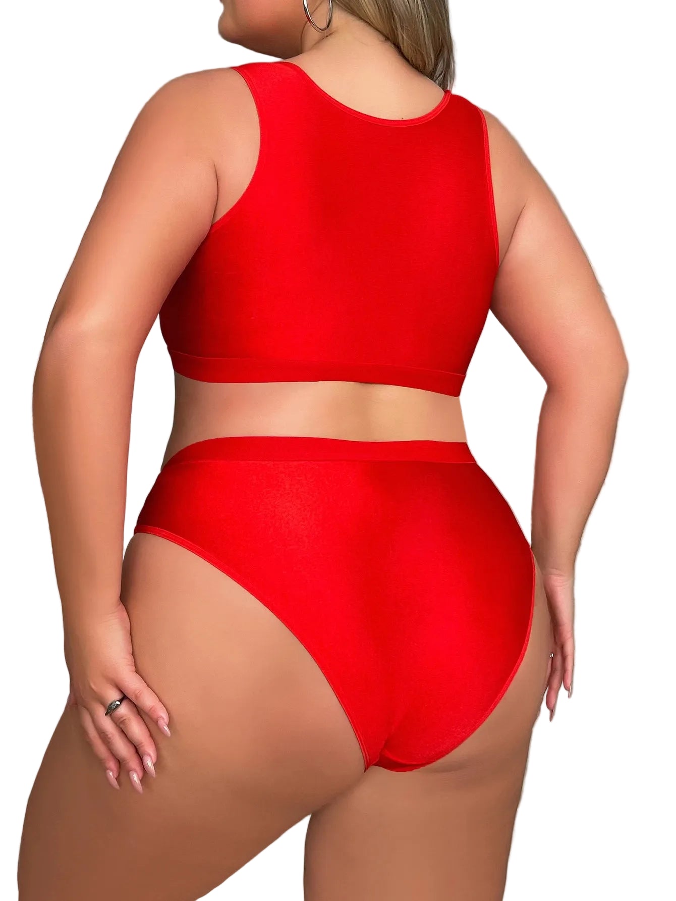 Person wearing a red bikini set on a staircase background