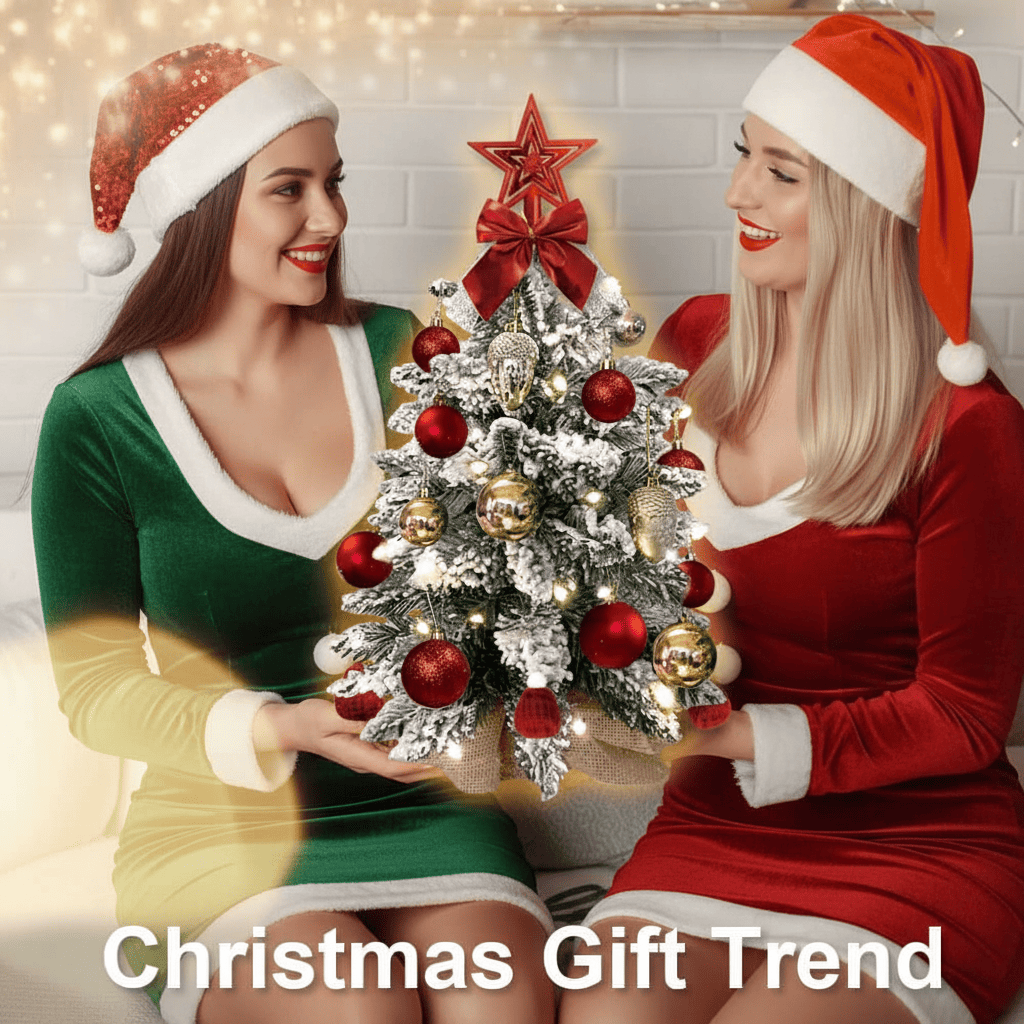 Two women in festive outfits holding a small Christmas tree with decorations.
