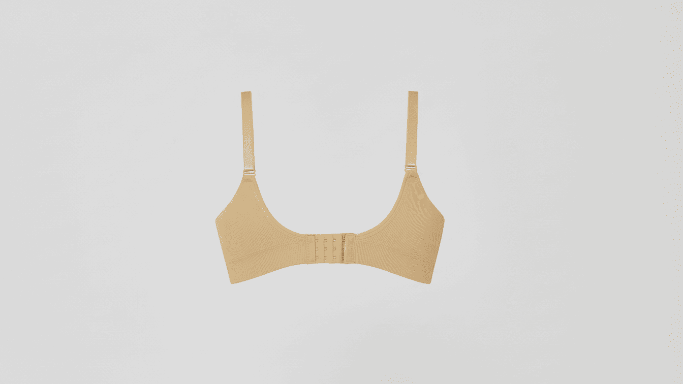 Beige bralette on a light gray background